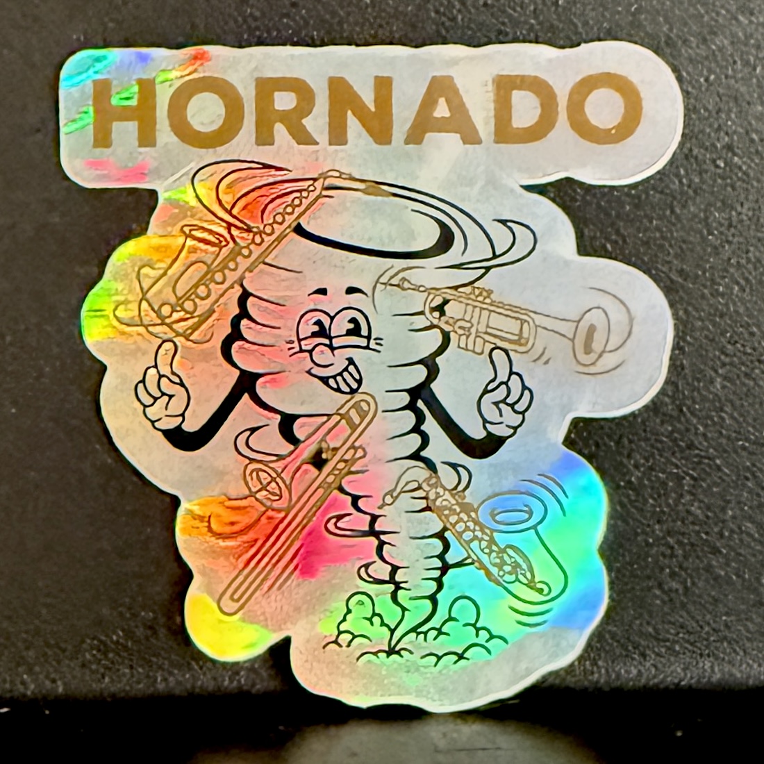 sticker of a tornado with horns swirling around it